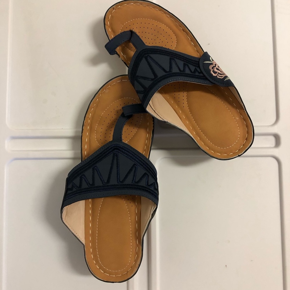 Low wedge blue sandals size 9 with rose detail
